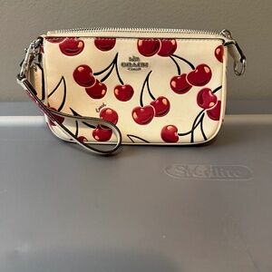 Coach Nolita 19 with cherry print wristlet
